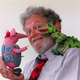 Peter Firmin with one of the Clangers and the Soup Dragon.